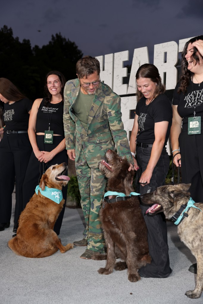 Brad Pitt gets into character in camo suit at ‘Heart of the Beast’ premiere