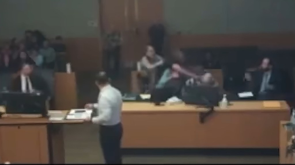 Grandfather pummels brute convicted of murdering his Army veteran son-in-law in explosive courtroom brawl