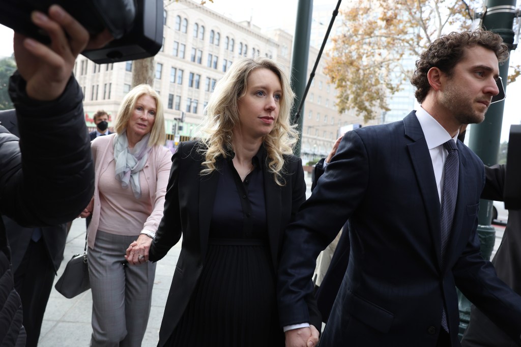 Elizabeth Holmes’ X account posts cryptic message and glam kissy selfie of imprisoned fraudster
