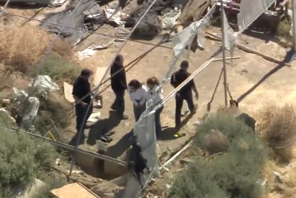 Frantic grave-digging effort in California desert uncovers human remains sparking murder investigation two weeks after man goes missing