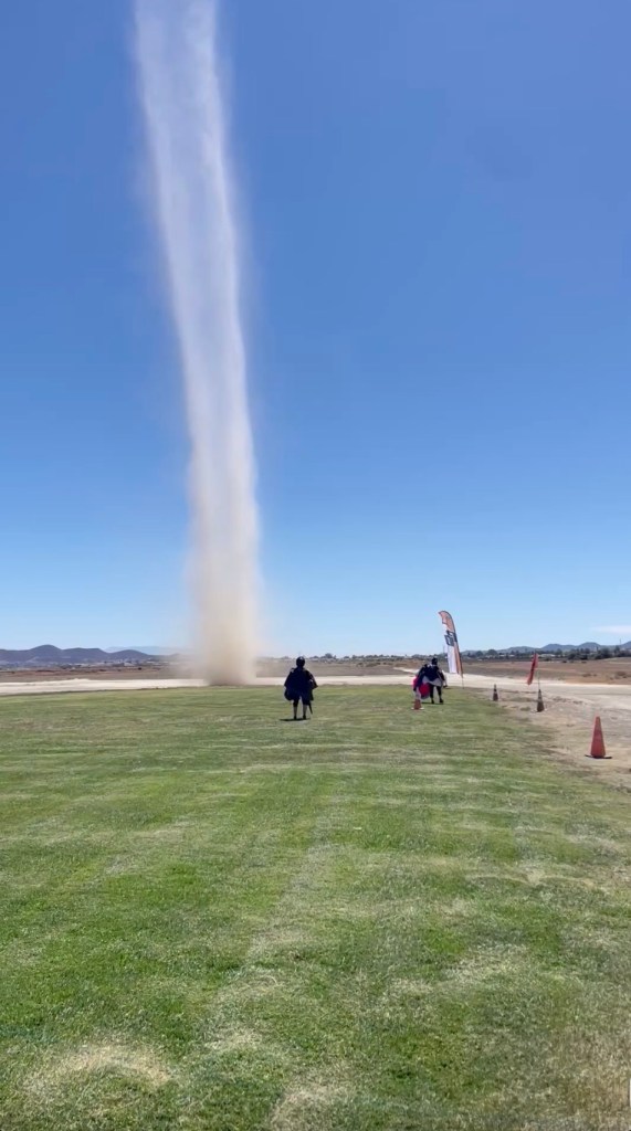 Terrifying moment massive dust devil erupts next to paragliders in California