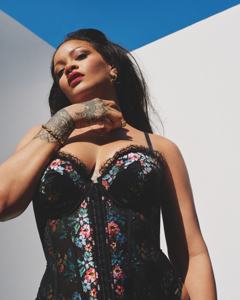 Rihanna gets cheeky in a lace corset and thong for Savage X Fenty