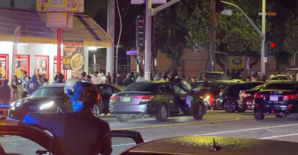 Cops crash massive LA street takeover, towing 100 cars and detaining hundreds