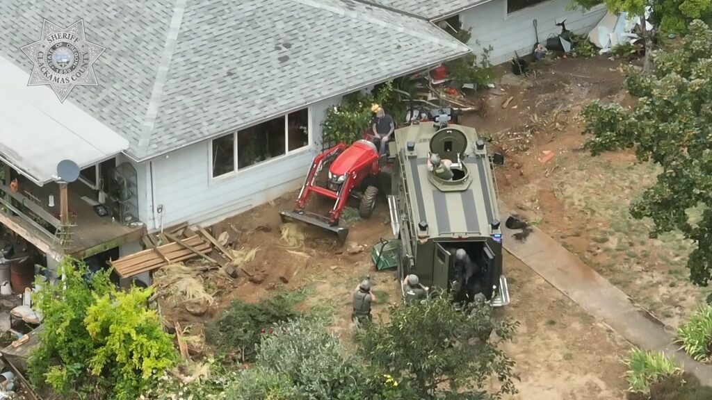 Unbelievable moment Oregon lunatic’s rifle-shooting tractor escape ends in a tank slamming disaster