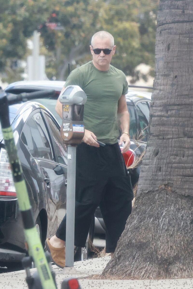 Colin Farrell shocks with newly shaved head in LA