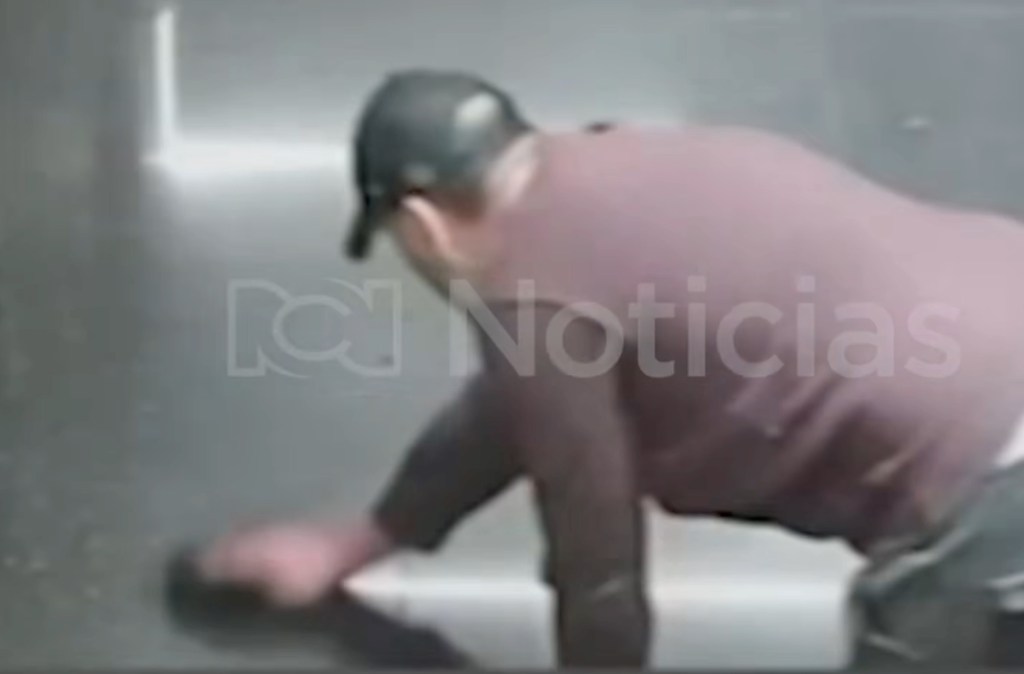 Video appears to show stalker doctor wiping blood from where model was murdered and stuffed in suitcase