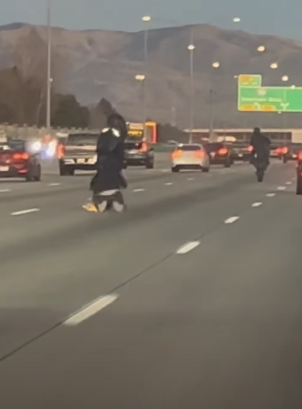 Instant karma for motorcyclist showing off on busy highway