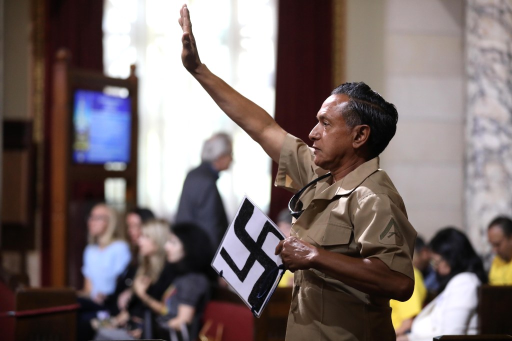 Wild moment LA gadfly storms City Hall meeting and humiliates Karen Bass in front of stunned councilors