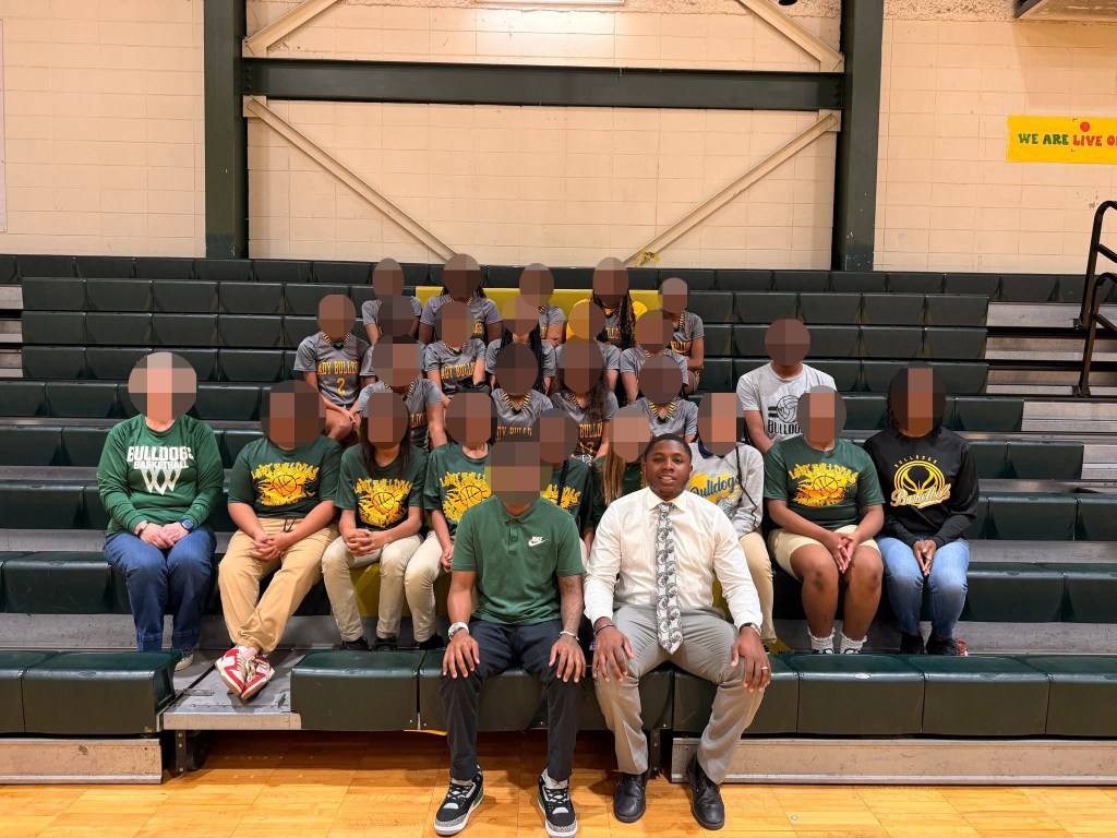 Middle school’s ‘Teacher of the Year’ accused of shooting two men in the street