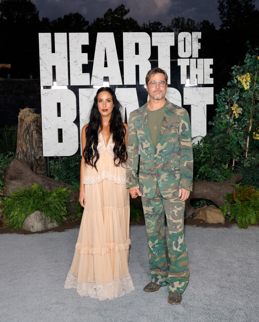 Brad Pitt gets into character in camo suit at ‘Heart of the Beast’ premiere