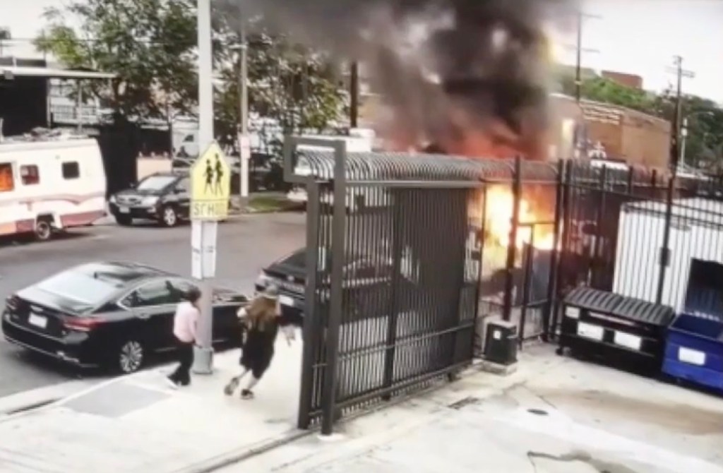 Hero stranger rescues helpless dog chained to Skid Row van after it’s set on fire