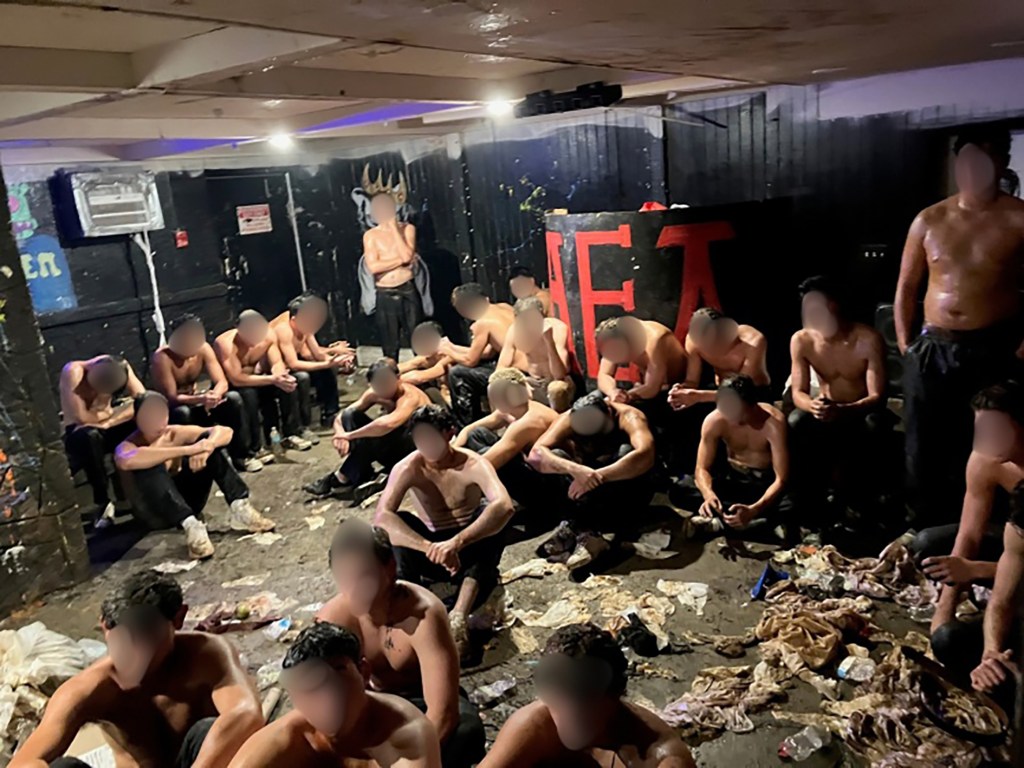 Frat leaders arrested after cops found dozens of nearly-naked teens in dingy basement in suspected hazing incident