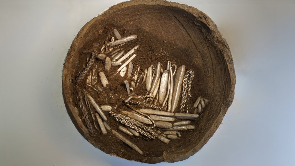 ‘Strange sound’ leads homeowner to unearth massive Viking silver hoard while digging for new patio