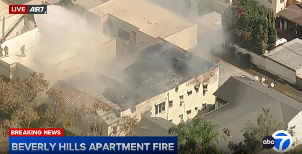 Massive fire engulfs Beverly Hills apartment complex as entire roof caves in
