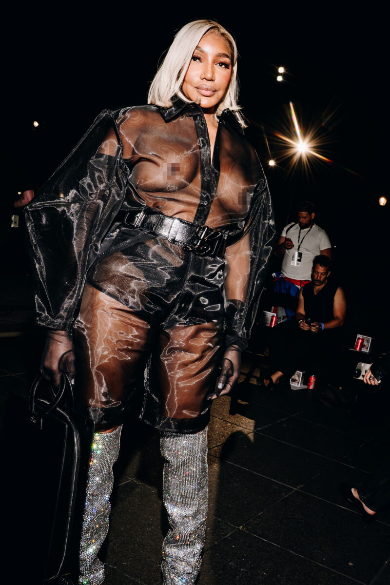Nene Leakes makes a dramatic entrance in a see-through top and shorts at NYFW