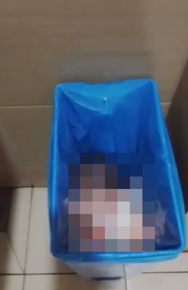 Newborn miraculously found alive after being tossed into Malaysian airport trash can