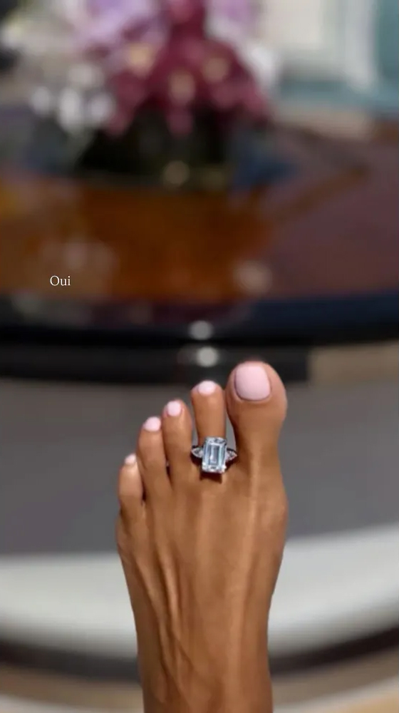 Brooks Nader levels up her pedicure with a massive aquamarine-set toe ring