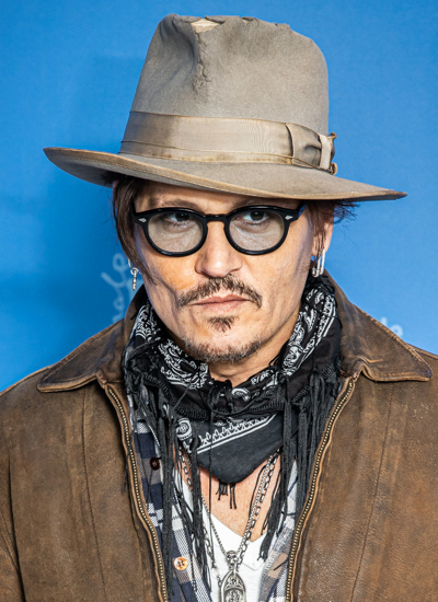 Johnny Depp eats decorative plant at Las Vegas party in bizarre video