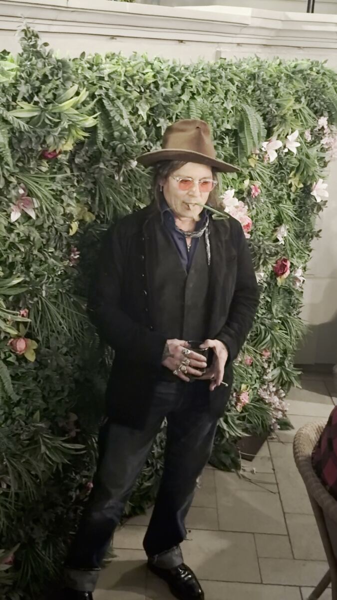 Johnny Depp eats decorative plant at Las Vegas party in bizarre video