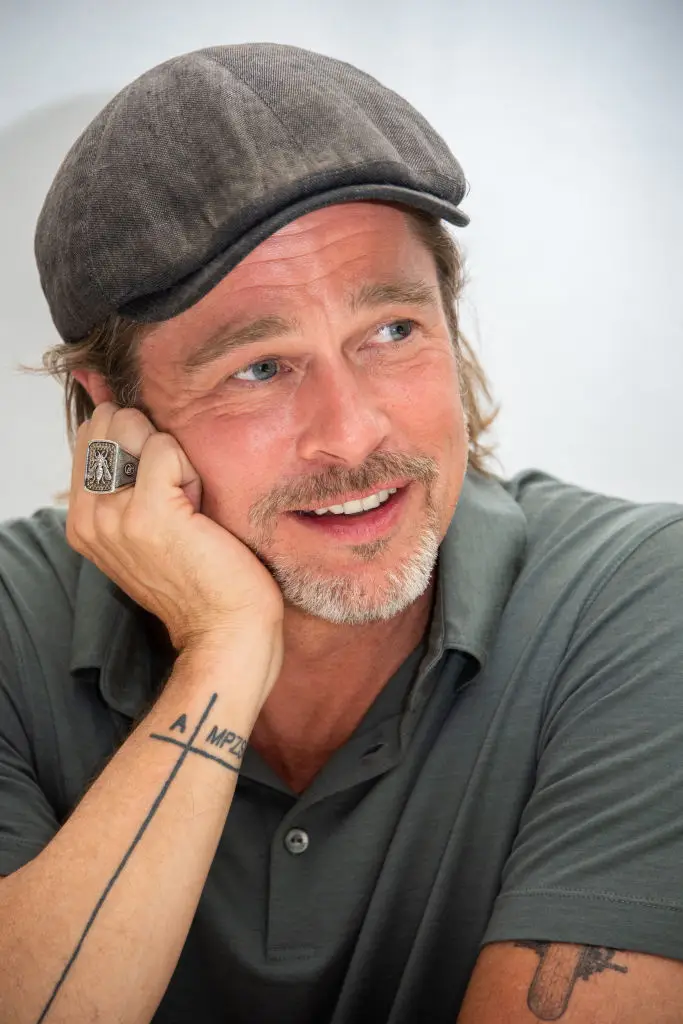 Meaning behind Brad Pitt's strange arm tattoo as fans notice details
