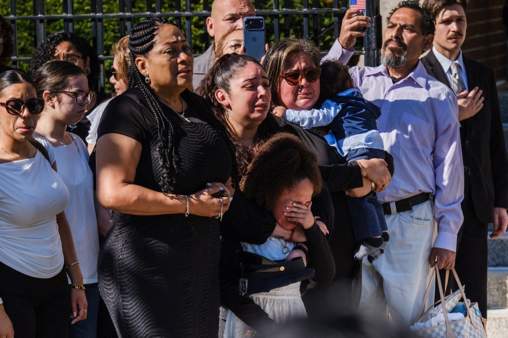 Heartwrenching funeral photos capture tearful young daughter of NYPD recruit who collapsed during run at Police Academy