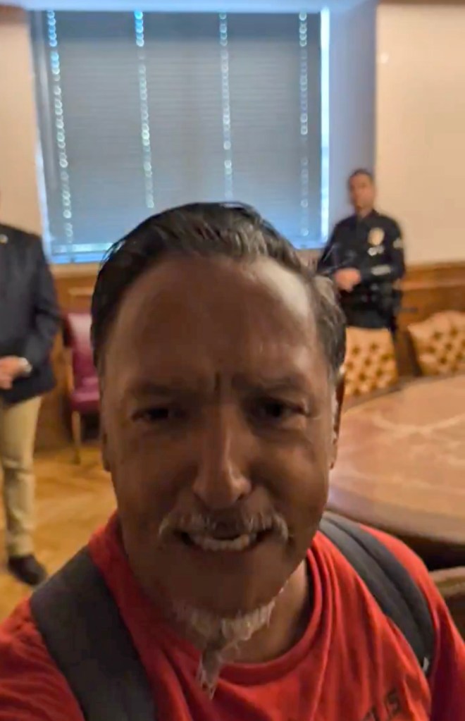 Wild moment LA gadfly storms City Hall meeting and humiliates Karen Bass in front of stunned councilors