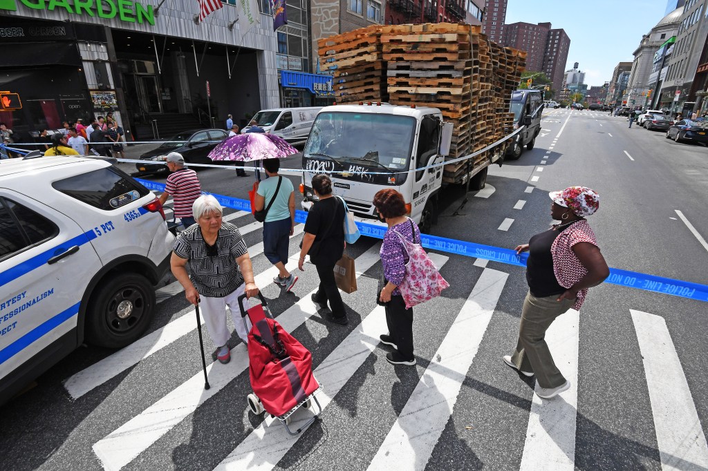 Elderly man killed, two others injured, as cargo truck careens onto busy NYC sidewalk