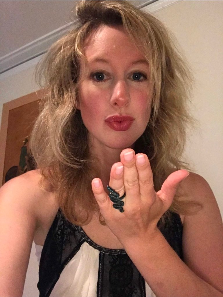 Elizabeth Holmes’ X account posts cryptic message and glam kissy selfie of imprisoned fraudster
