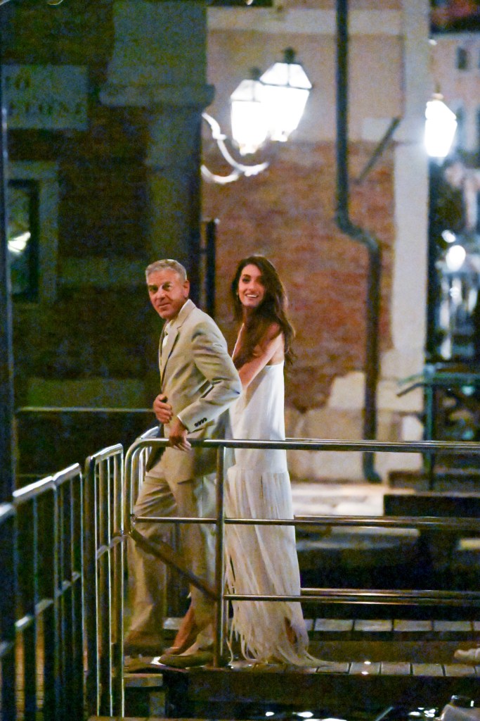 Amal Clooney visits Venice wedding venue in bridal white ahead of 12-year anniversary