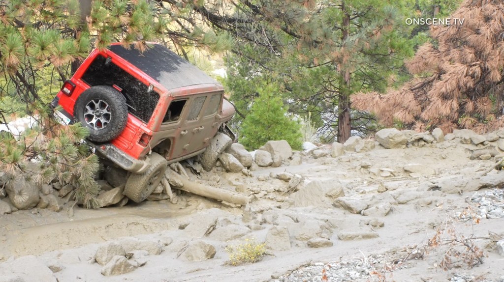 Freak storm sweeps Jeep passengers hundreds of feet down riverbed in SoCal mountains