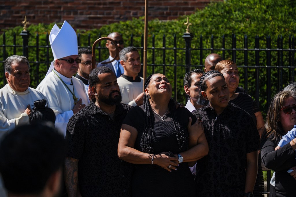 Heartwrenching funeral photos capture tearful young daughter of NYPD recruit who collapsed during run at Police Academy