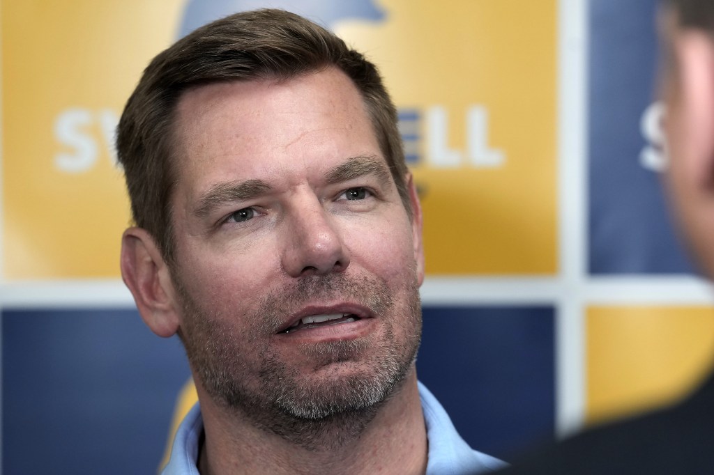 Moment disgraced Eric Swalwell is surrounded by FBI agents at San Francisco airport