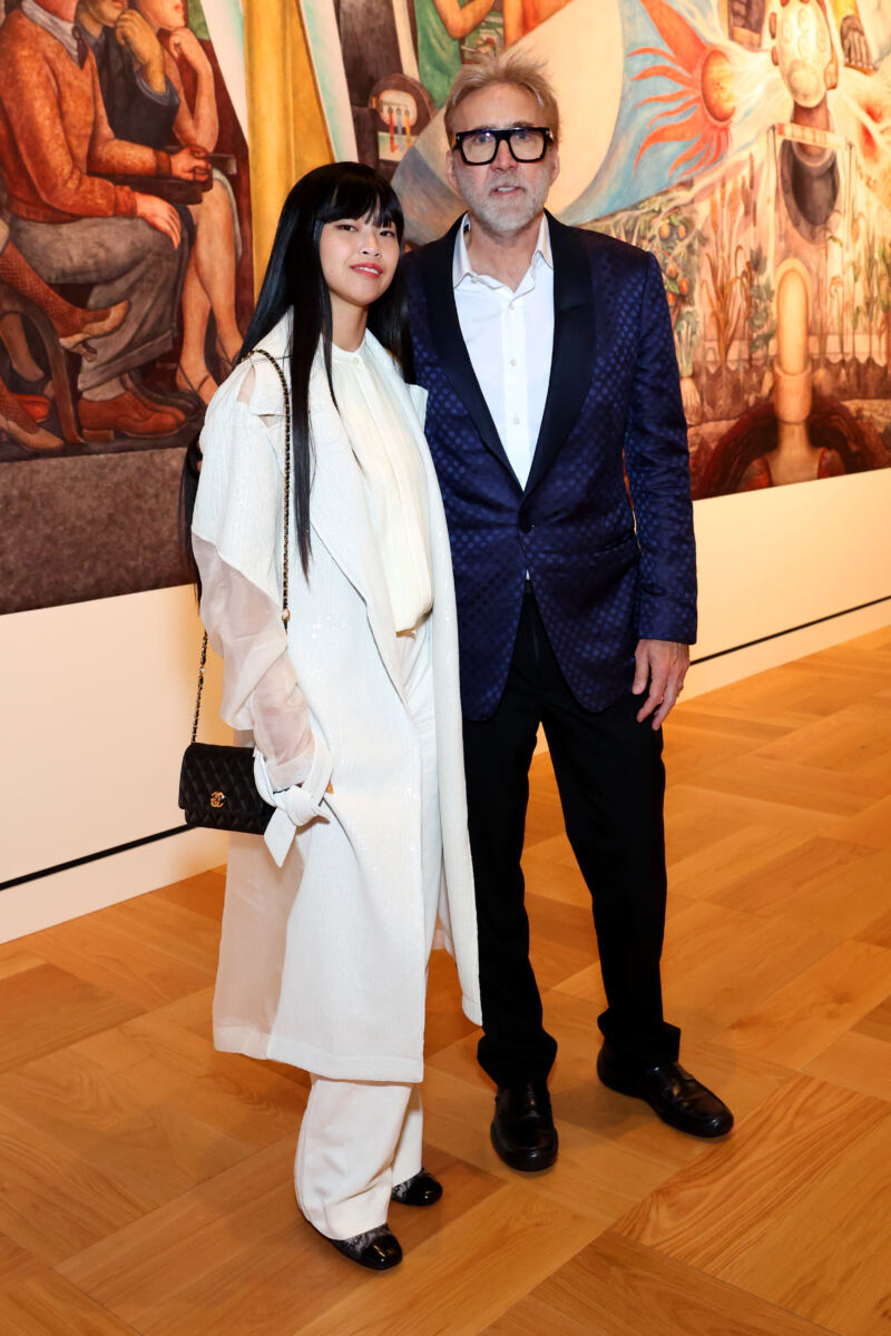 Barely recognizable Nicolas Cage, 62, sports gray beard in rare red carpet appearance with much-younger wife Riko Shibata, 31