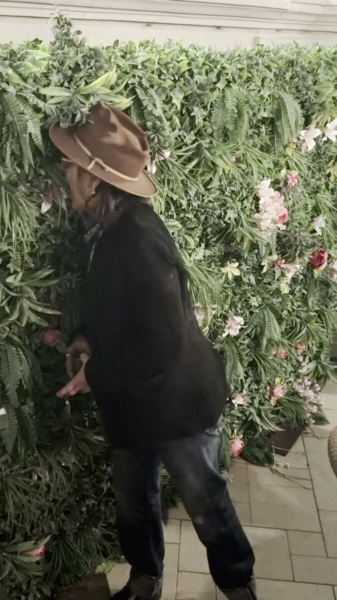 Johnny Depp eats decorative plant at Las Vegas party in bizarre video