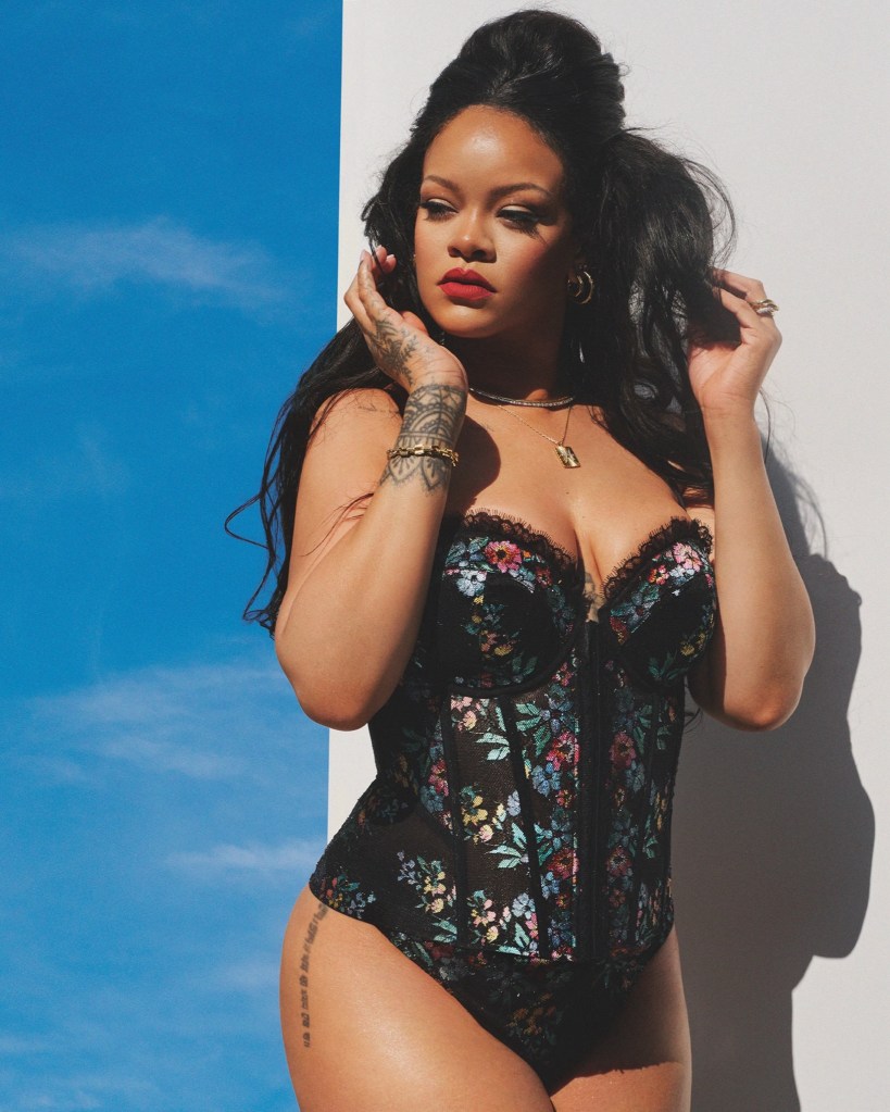 Rihanna gets cheeky in a lace corset and thong for Savage X Fenty