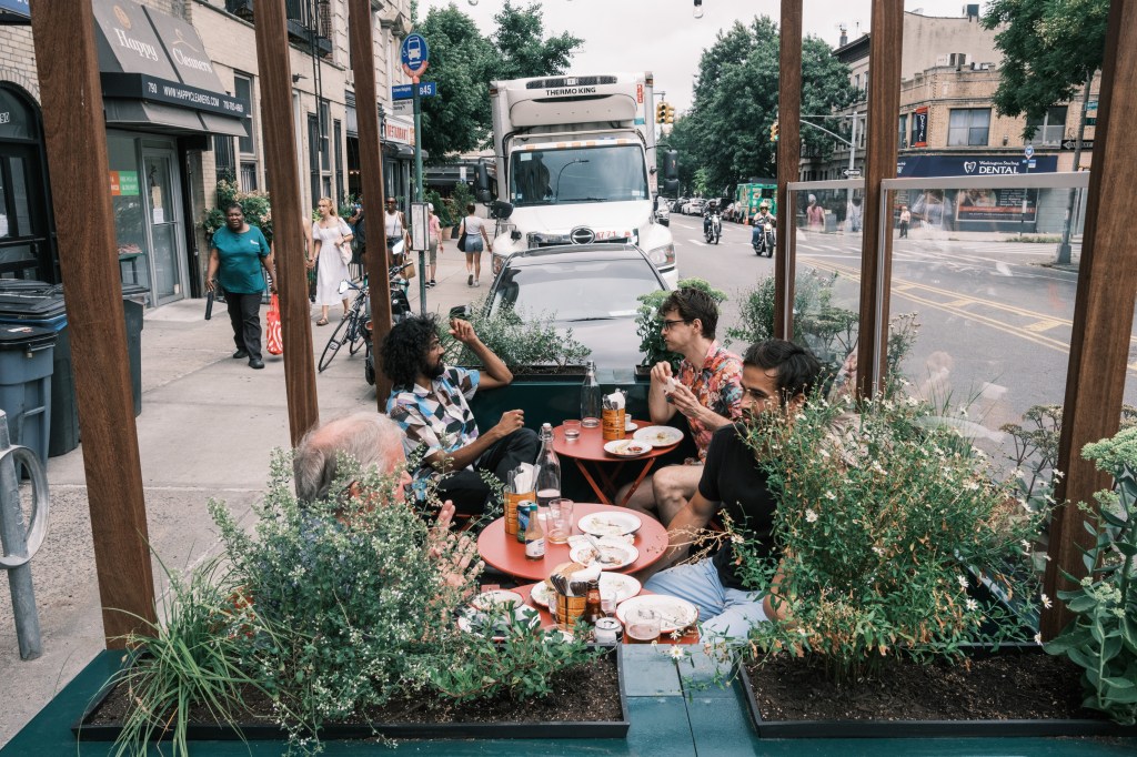 Mamdani signs law for year-round outdoor dining in NYC in social media-ready restaurant setting