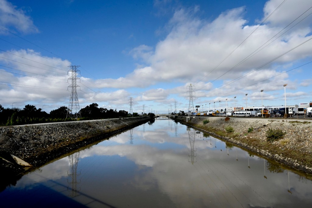 Mystery as bodies of young girl and man found in LA waterway after golfer makes horrifying discovery