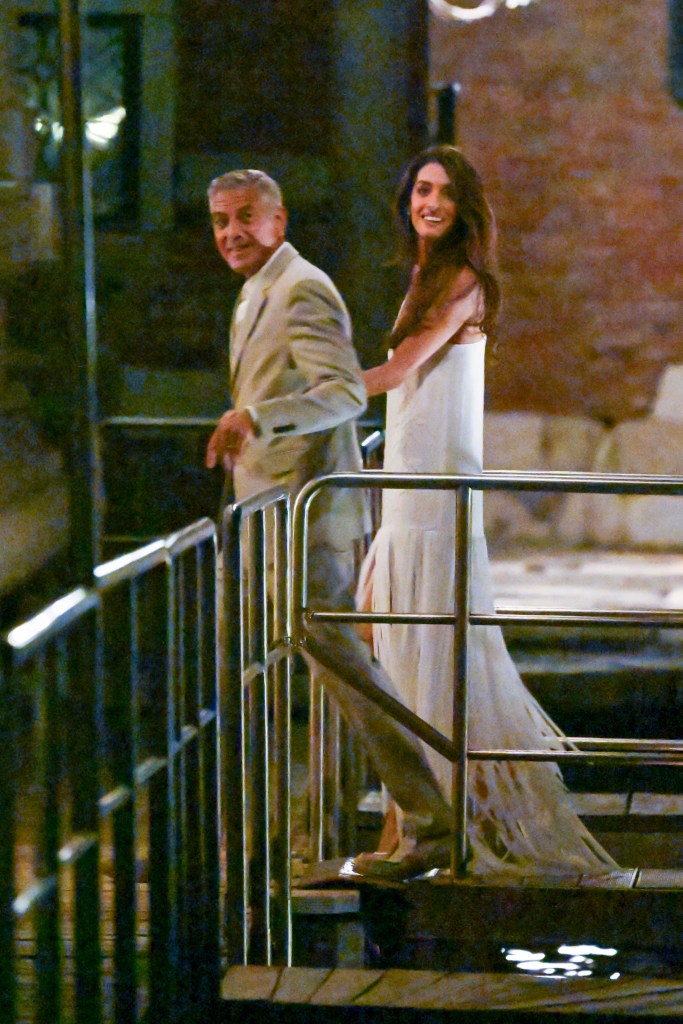 Amal Clooney visits Venice wedding venue in bridal white ahead of 12-year anniversary