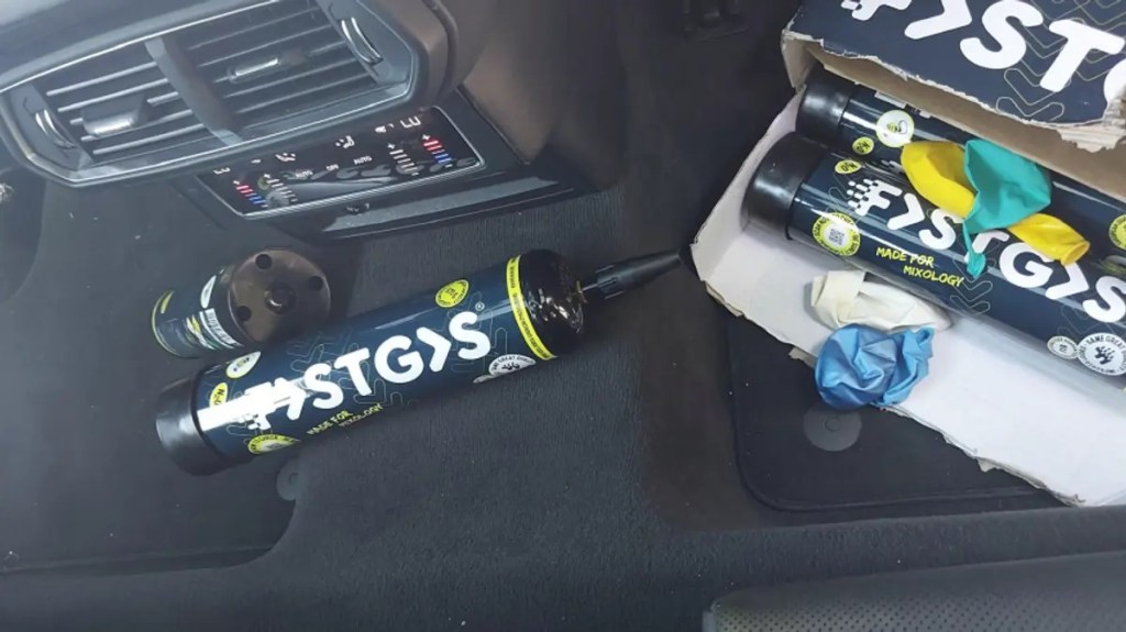 Incredible moment England soccer star caught with huge laughing gas canisters after crashing $360K Lamborghini