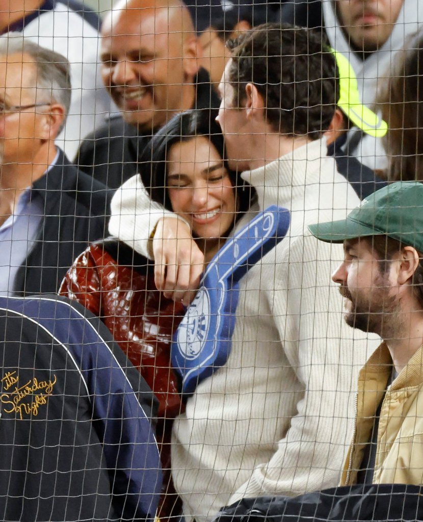 Dua Lipa sports $15K Chanel coat at Yankees playoff game with husband Callum Turner