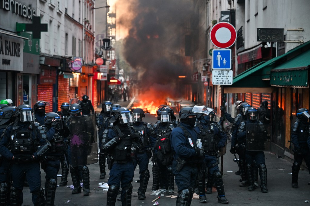 French rioters target Louis Vuitton, Hermes and Apple stores — as lux brands hire their own guards