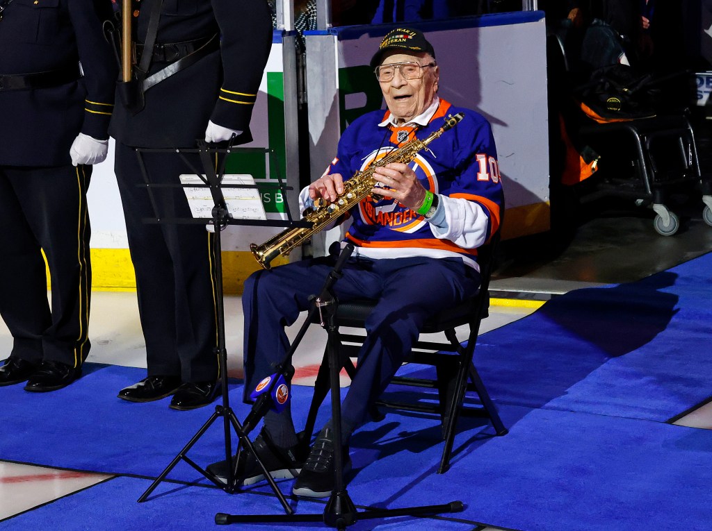 Beloved 105-year-old WWII vet returns to play national anthem at Islanders game