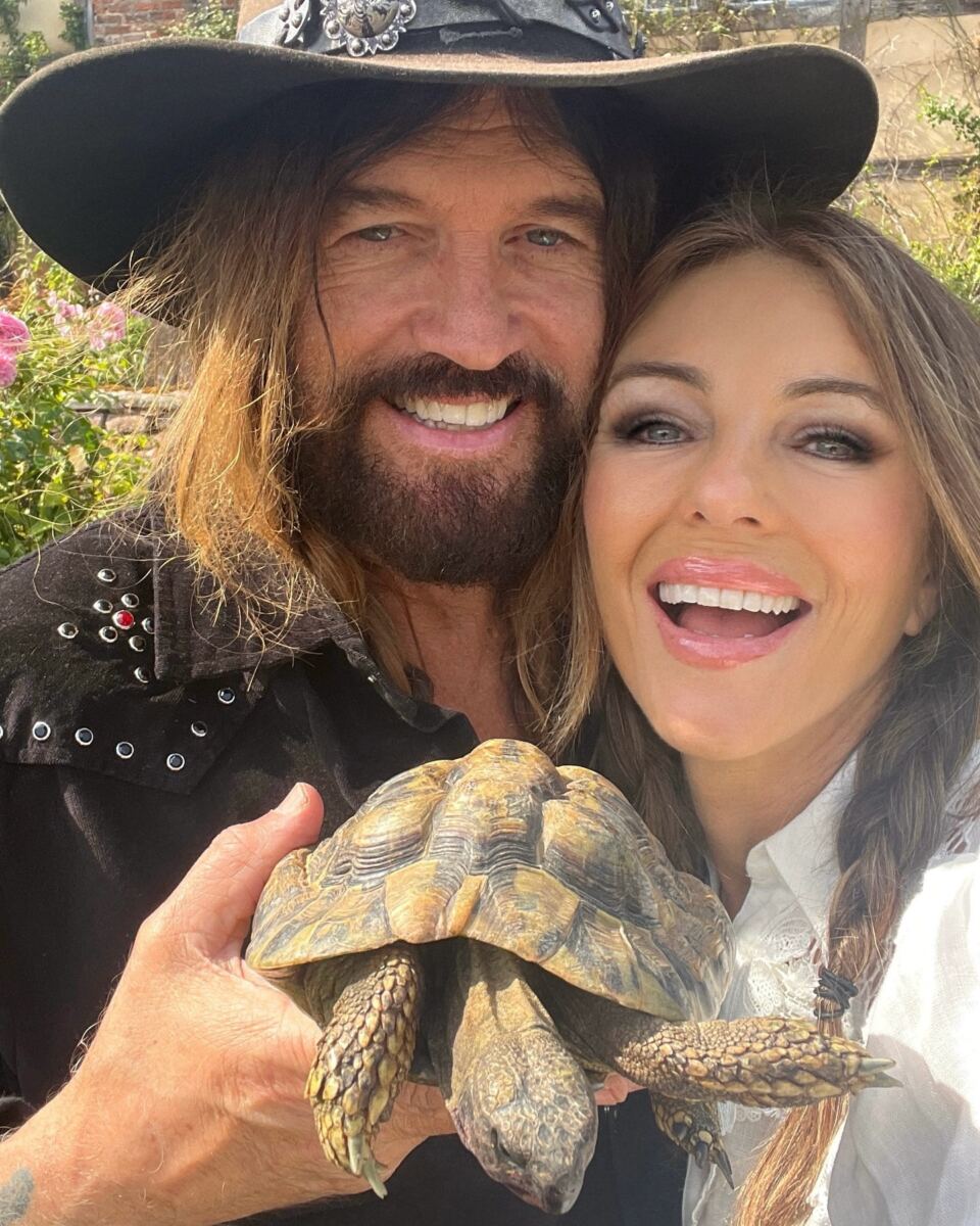Elizabeth Hurley and Billy Ray Cyrus take major step in their romance