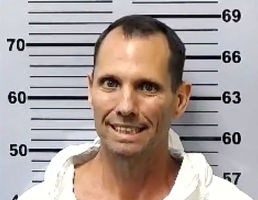 Sicko flashes chilling smile after he cut off heads of grandma and aunt with chainsaw: court doc