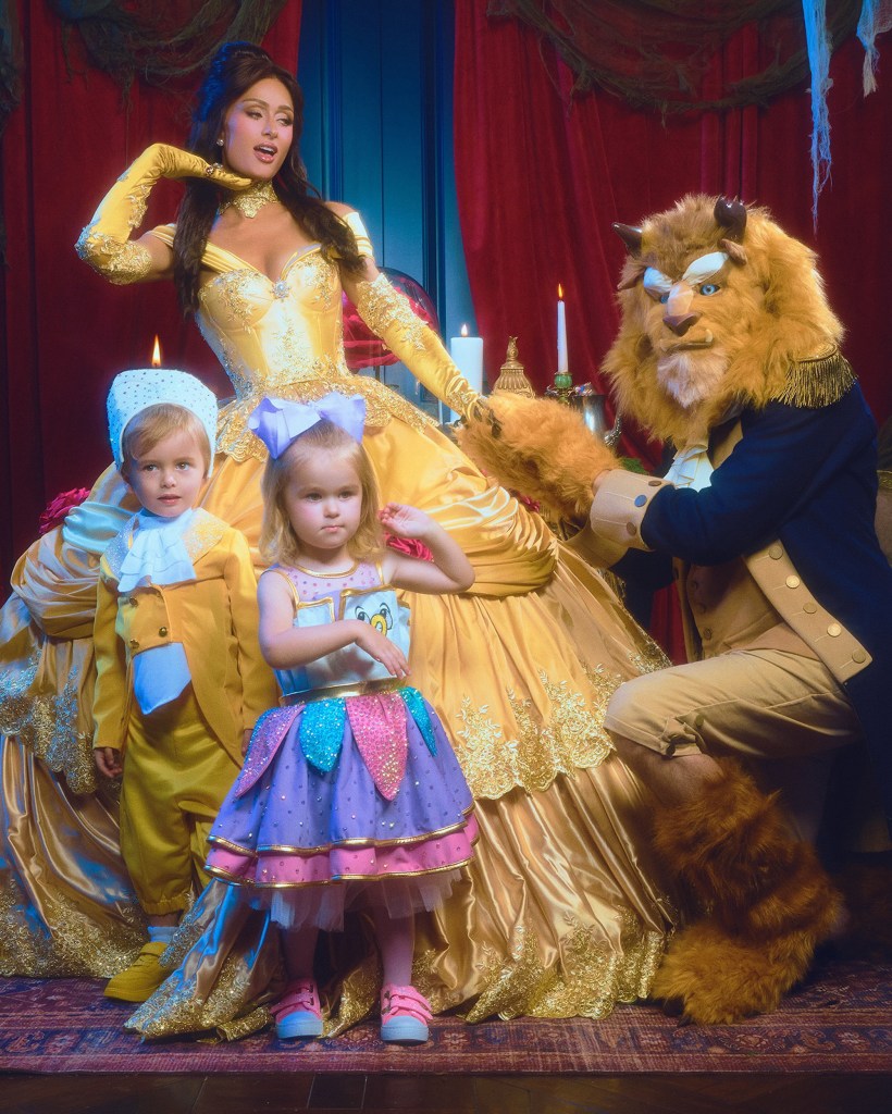 Paris Hilton gets the princess treatment in family Halloween shoot with her husband and kids