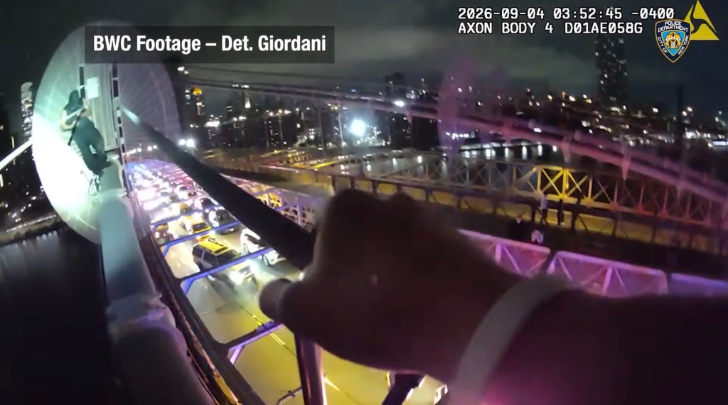 Drone footage captures moment police fatally shoot knife-wielding nut — as he lunges at them from atop the Brooklyn Bridge