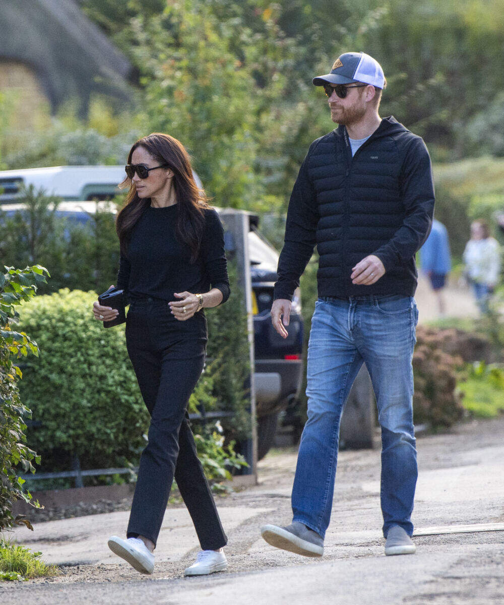 Prince Harry and Meghan Markle hold hands on romantic pub date in first photos together since UK return