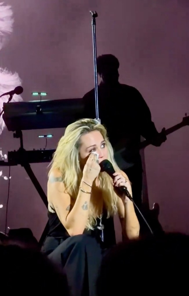 Miley Cyrus cries while honoring late godmother Dolly Parton at LA concert: ‘I miss her’