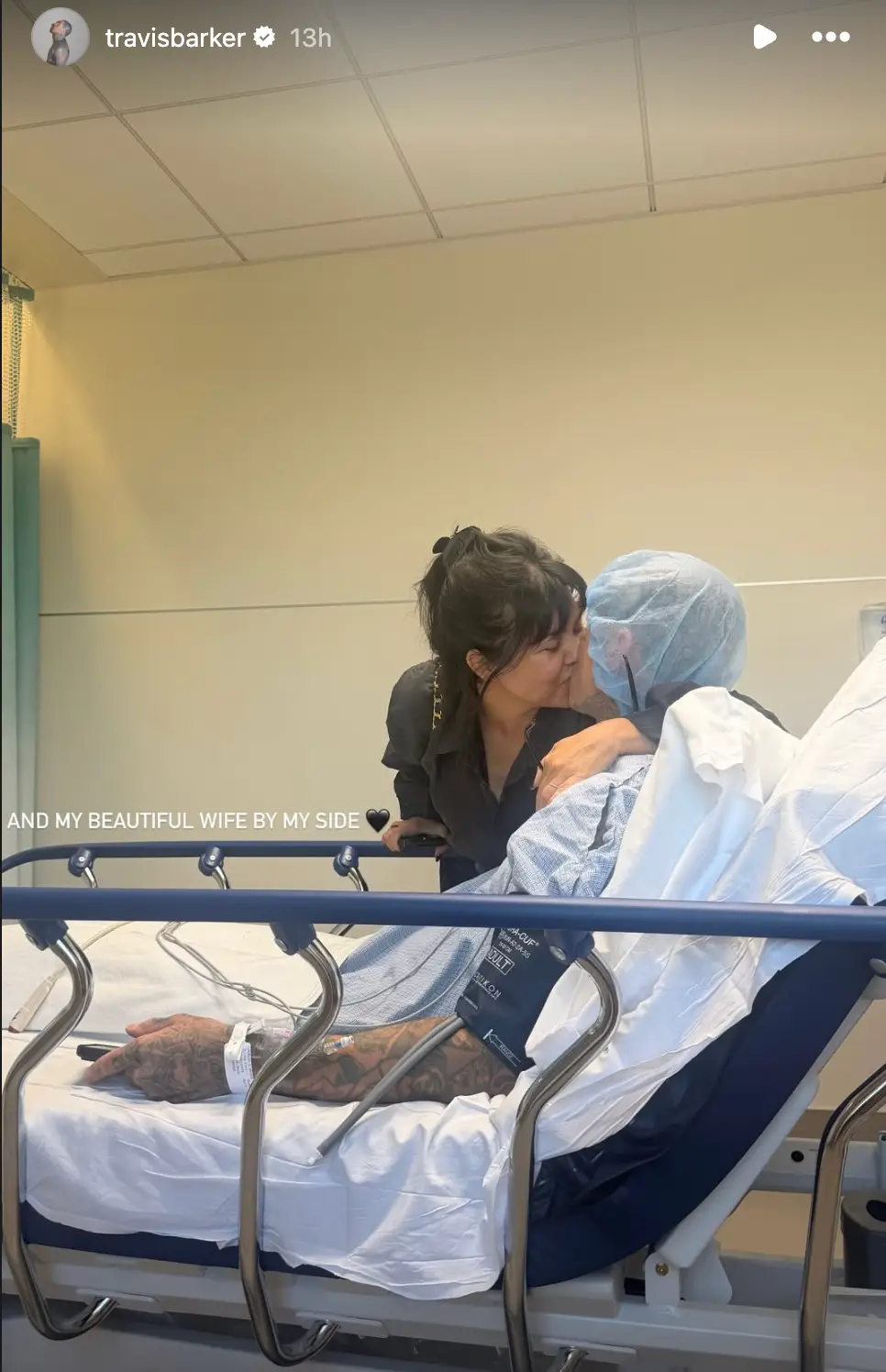 Travis Barker shares update from hospital bed and says wife Kourtney Kardashian is 'by my side'