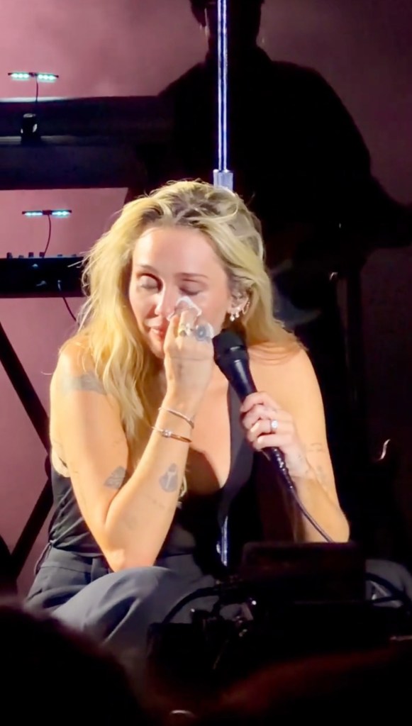 Miley Cyrus cries while honoring late godmother Dolly Parton at LA concert: ‘I miss her’